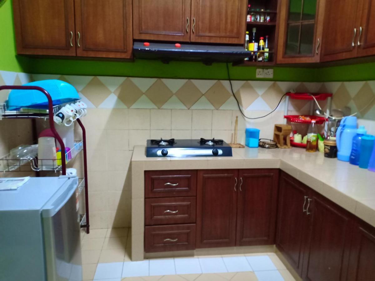Muslim Dinaim Homestay Танджунґ-Малім Екстер'єр фото